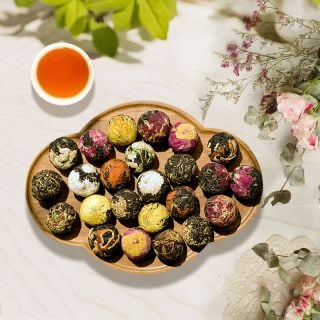 Handcrafted Blossom-Infused Dragon Pearl Yunnan Black Tea | Bustan.store